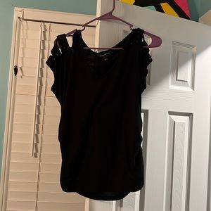 Black shirt with rock shoulders